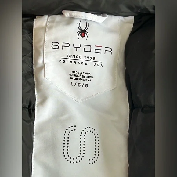 Spyder Women's White and Black long puffer jacket - Picture 16 of 16